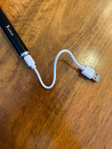 Charging cord plugged into charging port