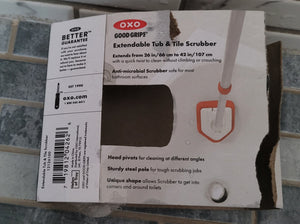 Back of the packaging with details about the length of the extender, the anti-microbial scrubber, pivoting head, steel pole, and unique shape. 