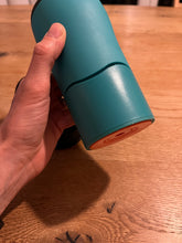 Load image into Gallery viewer, Side view of teal mug.
