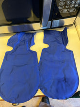 Load image into Gallery viewer, Two blue gel packs sitting on a counter in front of a microwave
