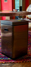 Load image into Gallery viewer, Full shot of the HUG&amp;FKL metal trash can (16 gal) from the side. A recessed handle is visible on one side.
