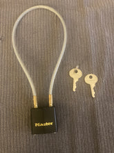 Load image into Gallery viewer, A small black lock with &quot;master&quot; written in gold has a long, thing cable wire with both ends attached to it, making a &quot;u&quot; shape. Two small keys are laying beside it.
