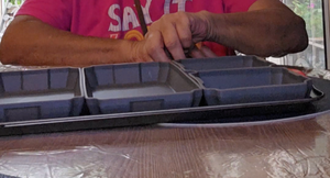 Side view of the silicone pans on the baking sheet.