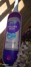 Load image into Gallery viewer, Close up of the Swiffer PowerMop solution cartridge attached in the mop
