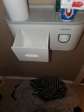 Load image into Gallery viewer, The white drawer is pulled out, with nothing inside. You can see the top of the shelf, with the small cup on one side and the toothpaste dispenser on the other side.
