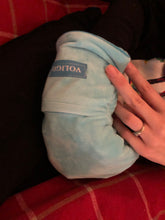 Load image into Gallery viewer, Blue mitt with the tag &quot;Voligo&quot; is being worn. The person&#39;s other hand is visible.
