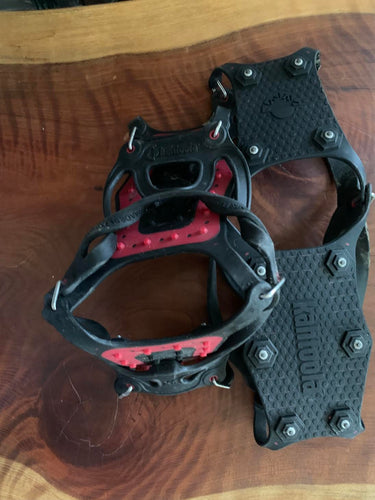 Black rubber with red elements and metal 