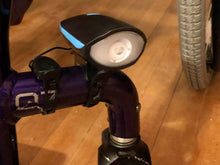 Load image into Gallery viewer, Letour light and horn set up on the front of a wheelchair   
