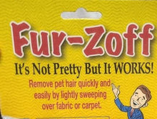 Load image into Gallery viewer, The front of the Fur-Zoff packing, which says &quot;it&#39;s not pretty but it works! Remove pet hair quickly and easily by lightly sweeping over fabric or carpet.&quot;
