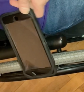 The phone mount can rotate 360 degrees, and the phone is rotating here.